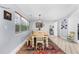 Inviting dining room featuring a large window for natural light and tiled flooring at 5742 Harbor Dr, Buford, GA 30518