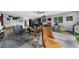 Spacious living room with natural light, comfortable seating, and a creative, eclectic design at 5742 Harbor Dr, Buford, GA 30518