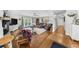 Spacious living room featuring hardwood floors, access to the outdoors, and a comfortable seating area at 5742 Harbor Dr, Buford, GA 30518