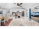 Bright, open concept with dining, kitchen, and bedroom areas providing flexible living space at 5742 Harbor Dr, Buford, GA 30518