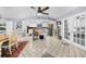Bright, open concept with dining, kitchen, and bedroom areas providing flexible living space at 5742 Harbor Dr, Buford, GA 30518