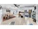 Bright, open concept with dining, kitchen, and bedroom areas providing flexible living space at 5742 Harbor Dr, Buford, GA 30518