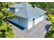 Home with gray shingles and white trim showing off multiple windows to let light inside at 8612 Campbellton St, Douglasville, GA 30134