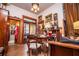 Traditional study featuring desk, fireplace, and ornate decor at 8612 Campbellton St, Douglasville, GA 30134