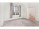 Bedroom with gray carpet and view of city through window at 1101 Juniper Ne St # 919, Atlanta, GA 30309