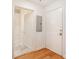 Welcoming entryway with hardwood floors, a closet, and access to the bathroom for convenience at 1101 Juniper Ne St # 919, Atlanta, GA 30309