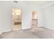 Main bedroom with view to bathroom and large walk-in closet at 1101 Juniper Ne St # 919, Atlanta, GA 30309