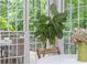 Bright breakfast nook with large windows, letting in plenty of natural light and showcasing the beautiful outdoor scenery at 1161 Arborhill Dr, Woodstock, GA 30189