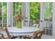 Charming breakfast nook featuring a round table and chairs, perfect for enjoying morning coffee at 1161 Arborhill Dr, Woodstock, GA 30189