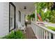 Spacious porch with rocking chair seating at 1161 Arborhill Dr, Woodstock, GA 30189