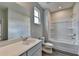 Bathroom featuring a toilet, vanity with sink, bathtub and shower combo at 3968 Annsbury Court, Lilburn, GA 30047