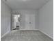 Neutral bedroom featuring carpet flooring, light walls, and a walk-in closet at 3968 Annsbury Court, Lilburn, GA 30047