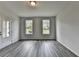 Entry with wood-look floors and natural light at 3968 Annsbury Court, Lilburn, GA 30047