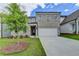 Charming two-story brick home with an attached two-car garage and newly planted front yard at 3968 Annsbury Court, Lilburn, GA 30047