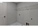 Laundry room featuring washer hookups and shelving above at 3968 Annsbury Court, Lilburn, GA 30047