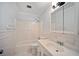 Bright, all-white bathroom featuring a shower-tub combo and vanity with storage at 5400 Roswell Rd # L-3, Atlanta, GA 30342