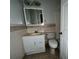 Bathroom featuring a tile backsplash and floors, with a toilet and sink at 5400 Roswell Rd # L-3, Atlanta, GA 30342