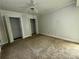 Bedroom featuring wall-to-wall carpeting and double closets at 5400 Roswell Rd # L-3, Atlanta, GA 30342