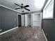 Bedroom with neutral carpet, closet and ceiling fan at 5400 Roswell Rd # L-3, Atlanta, GA 30342