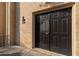 Close up of a unit entrance featuring double front doors and brick facade detail at 5400 Roswell Rd # L-3, Atlanta, GA 30342