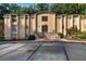 Attractive brick apartment building featuring well-maintained landscaping and a welcoming entrance at 5400 Roswell Rd # L-3, Atlanta, GA 30342
