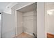 Laundry area featuring tile floors with a washing machine hookup, shelving, and a utility sink at 5400 Roswell Rd # L-3, Atlanta, GA 30342
