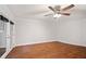 Living room featuring hardwood floors and sliding glass doors to the outside at 5400 Roswell Rd # L-3, Atlanta, GA 30342