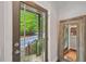 Welcoming entryway featuring a view of the outside and an elegant mirror at 62 High Top Pt, Sandy Springs, GA 30328