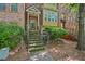 Inviting front entrance featuring stone steps and a glass-paneled door at 62 High Top Pt, Sandy Springs, GA 30328