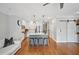 Open-concept kitchen with large island, stainless steel appliances, and hardwood floors at 62 High Top Pt, Sandy Springs, GA 30328