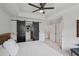Bright main bedroom includes ceiling fan, and entrance to a large walk-in closet at 62 High Top Pt, Sandy Springs, GA 30328