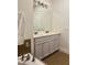 Elegant bathroom featuring dual sinks and bathtub with modern faucets at 702 Emeril Dr, Avondale Estates, GA 30002