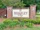 Berkeley Village community sign set among manicured landscaping and greenery at 702 Emeril Dr, Avondale Estates, GA 30002