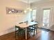 Dining room area with hardwood floors and modern lighting at 702 Emeril Dr, Avondale Estates, GA 30002