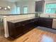 Kitchen with granite countertops and modern appliances at 702 Emeril Dr, Avondale Estates, GA 30002
