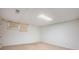 Finished basement featuring neutral carpeting, paneled walls, and natural light from a basement window at 2790 Westhampton Way, Tucker, GA 30084