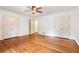 Main bedroom with hardwood floors, closet doors, and neutral colors at 2790 Westhampton Way, Tucker, GA 30084