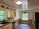 Bright kitchen with lots of natural light, stainless steel appliances, and tile floors at 2790 Westhampton Way, Tucker, GA 30084