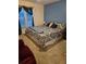 Cozy bedroom with large bed, textured carpet, and natural light from the window at 4299 Sherwood Oaks Dr, Decatur, GA 30034