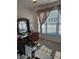 Bright bedroom with a desk setup by a sunny window and chair, ideal for a home office at 4299 Sherwood Oaks Dr, Decatur, GA 30034