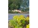 Entrance to Sherwood Oaks featuring a stone sign with beautiful landscaping at 4299 Sherwood Oaks Dr, Decatur, GA 30034