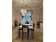 Dining room featuring a chandelier and neutral decor, perfect for entertaining at 4299 Sherwood Oaks Dr, Decatur, GA 30034