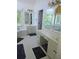 Spacious main bathroom with double vanities, a soaking tub and natural light at 4299 Sherwood Oaks Dr, Decatur, GA 30034