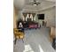 Spacious main bedroom suite with tray ceilings, a TV, large bed, and window at 4299 Sherwood Oaks Dr, Decatur, GA 30034