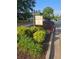 Community sign for Sherwood Oaks nestled in lush greenery, offering a welcoming first impression at 4299 Sherwood Oaks Dr, Decatur, GA 30034