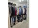 Spacious walk-in closet filled with an extensive wardrobe and organized storage solutions at 4299 Sherwood Oaks Dr, Decatur, GA 30034