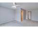Spacious bedroom with neutral paint, carpet and ceiling fan at 124 Camry Ln, Grayson, GA 30017