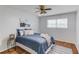 This bedroom features hardwood floors and a bright sunny window at 1728 Hudson Rd, Decatur, GA 30033