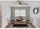Inviting dining room with a classic table setting and a view of the backyard at 1728 Hudson Rd, Decatur, GA 30033