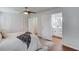 Bright primary bedroom featuring a view to the ensuite bathroom and a walk-in closet at 1728 Hudson Rd, Decatur, GA 30033